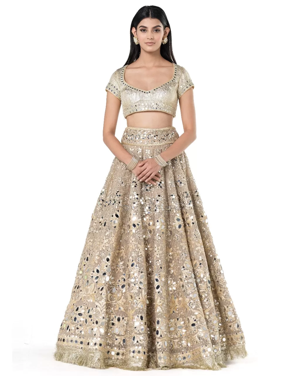 Beige Heavily Embellished Golden Lehenga Set